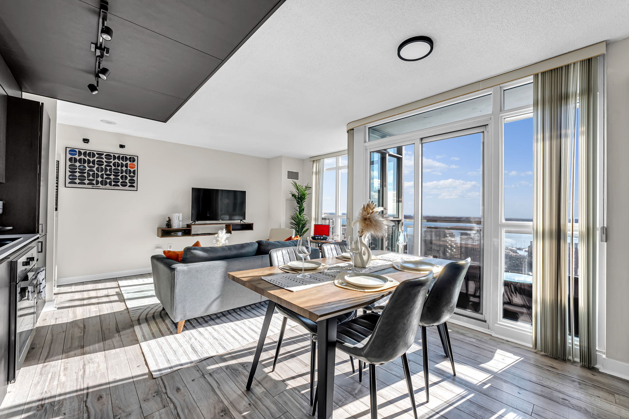 Staged open-concept living and dining area in a Certus-managed CityPlace rental at 15 Iceboat Terrace