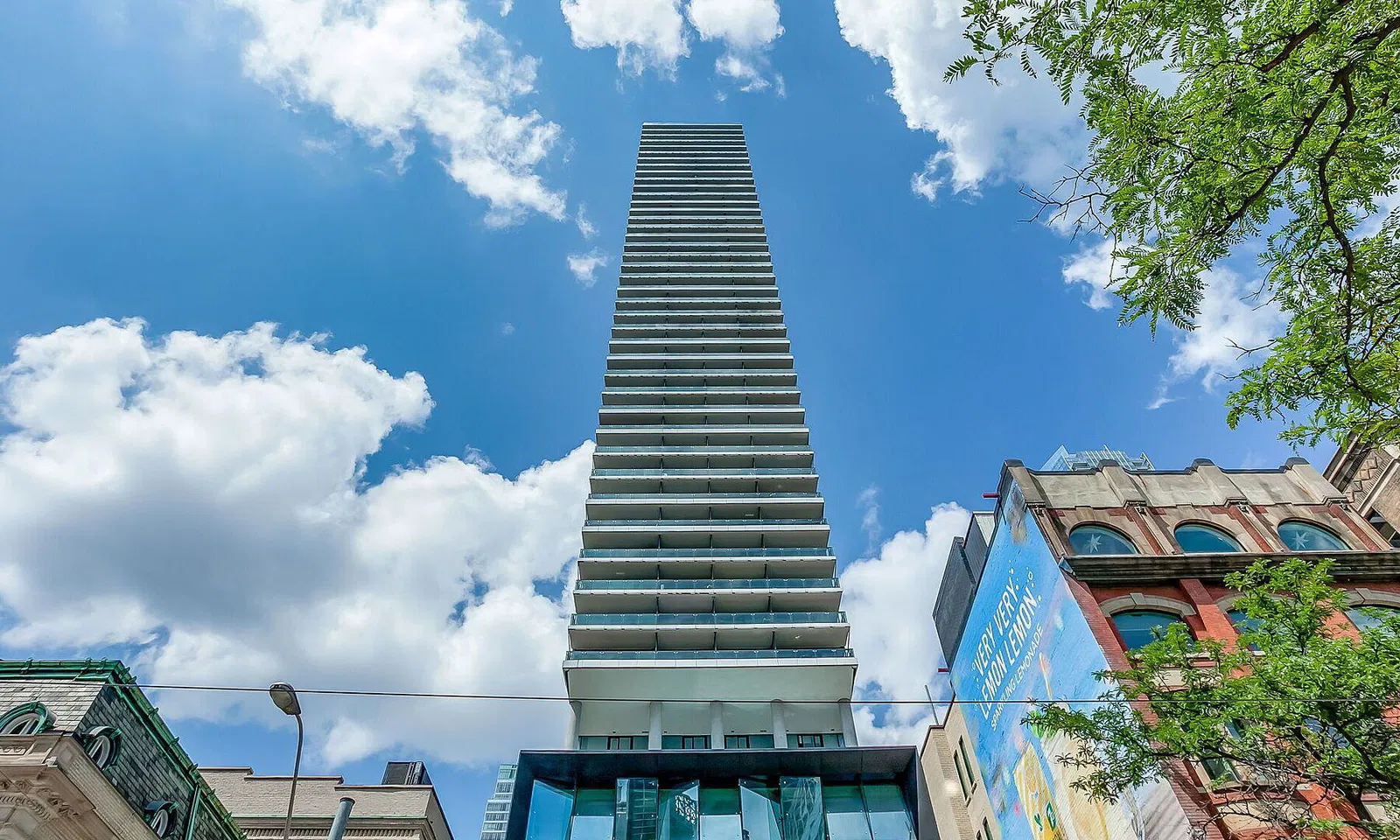 Theatre Park tower at 224 King St W rising above King Street in Toronto's Entertainment District