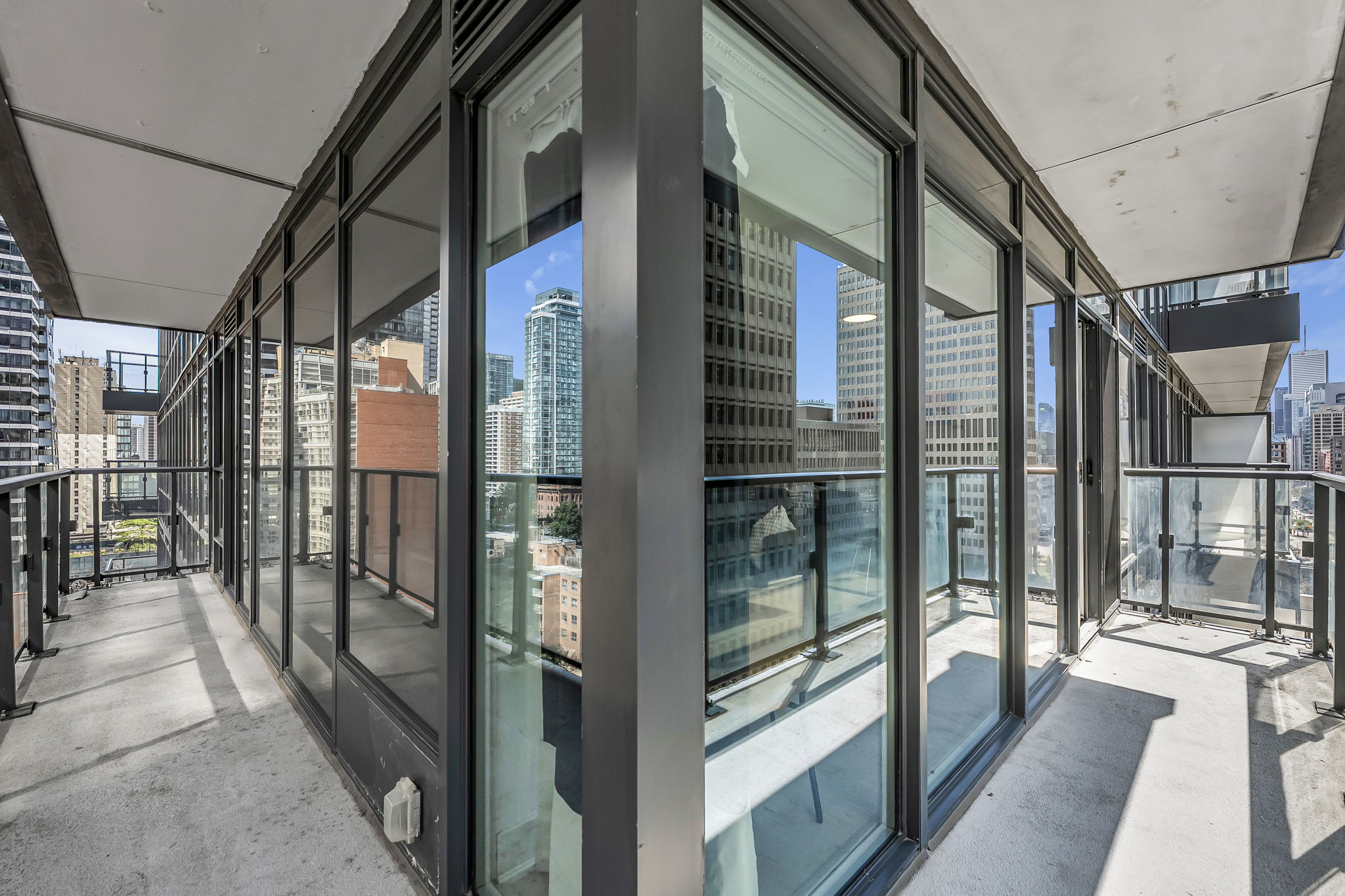 Wraparound balcony with downtown views at 955 Bay St, Toronto